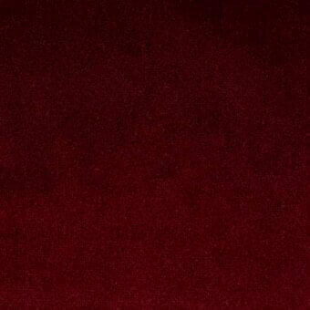 Red Azimut fabric sample with a dense, granular texture and subtle tonal variations, model 9b36 from Bonaldo’s fabric collection.
